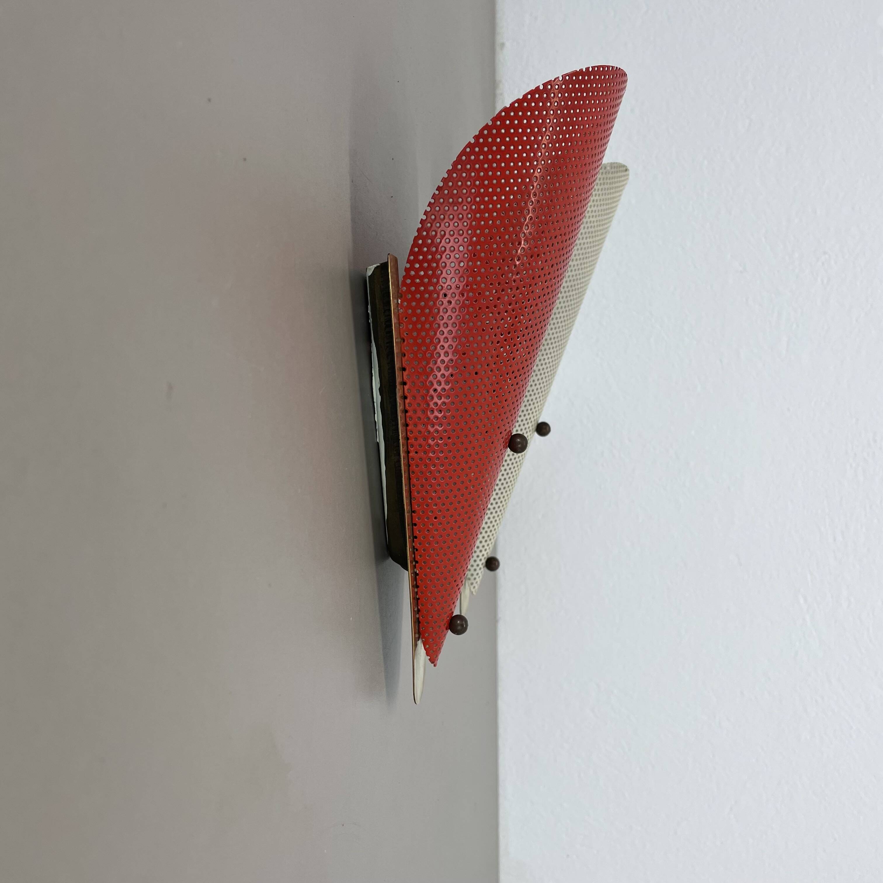 Set of two hole pattern theatre wall light sconces, france, 1950