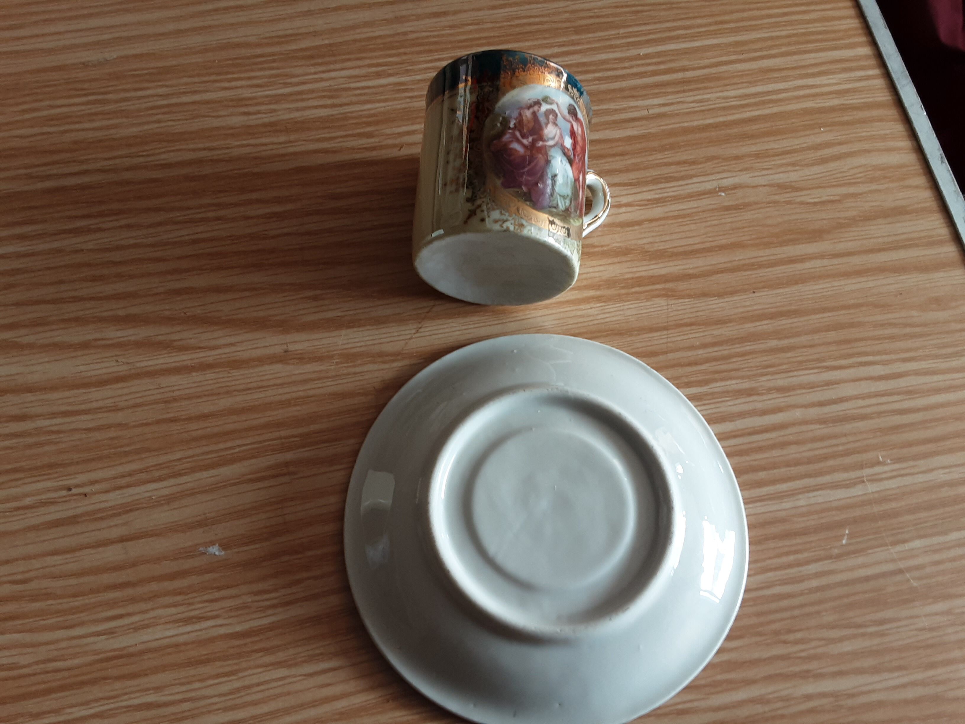 Cup and under cup porcelain scenes galantes