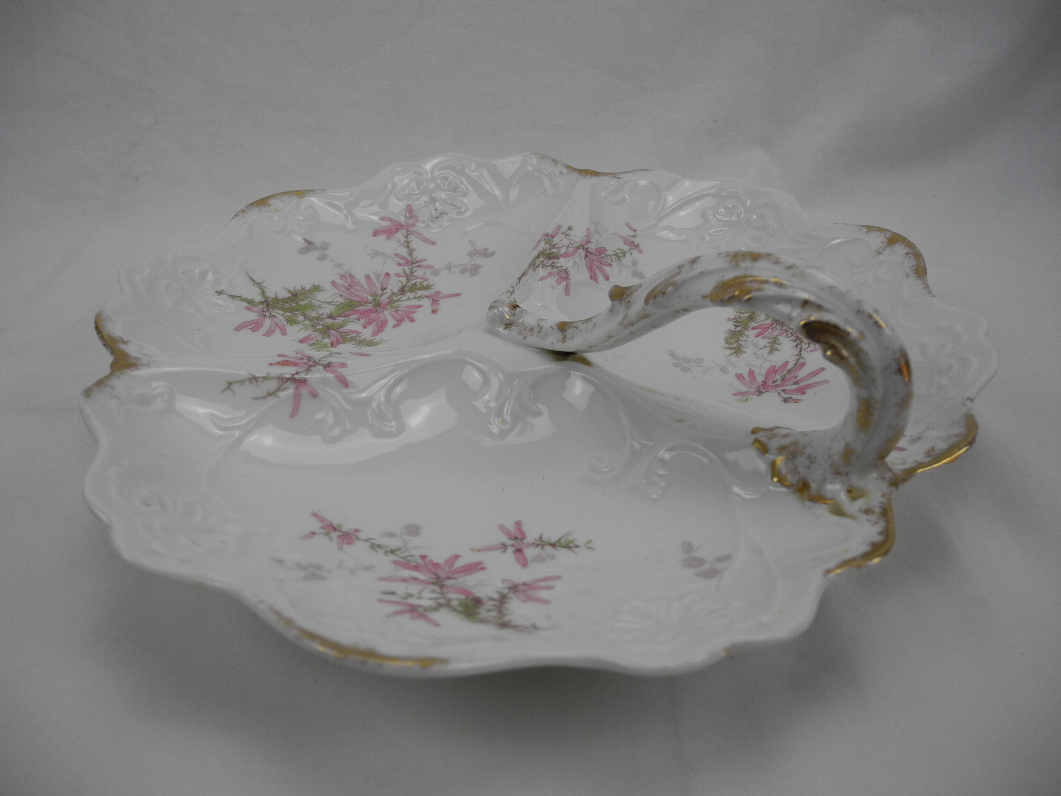 Old porcelain beggar serving dish