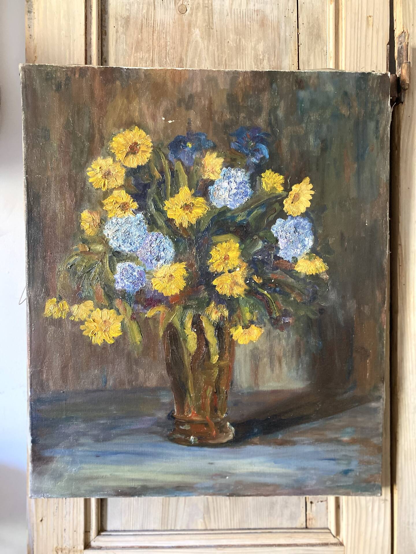 Oil on canvas, bouquet of yellow and blue flowers, mid-20th century.