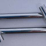 Twelve 70s design metal knife holders
