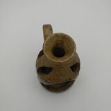 Stoneware candle holder.