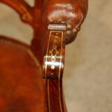 19th century armchair in leather and rosewood inlaid with brass and rosewood