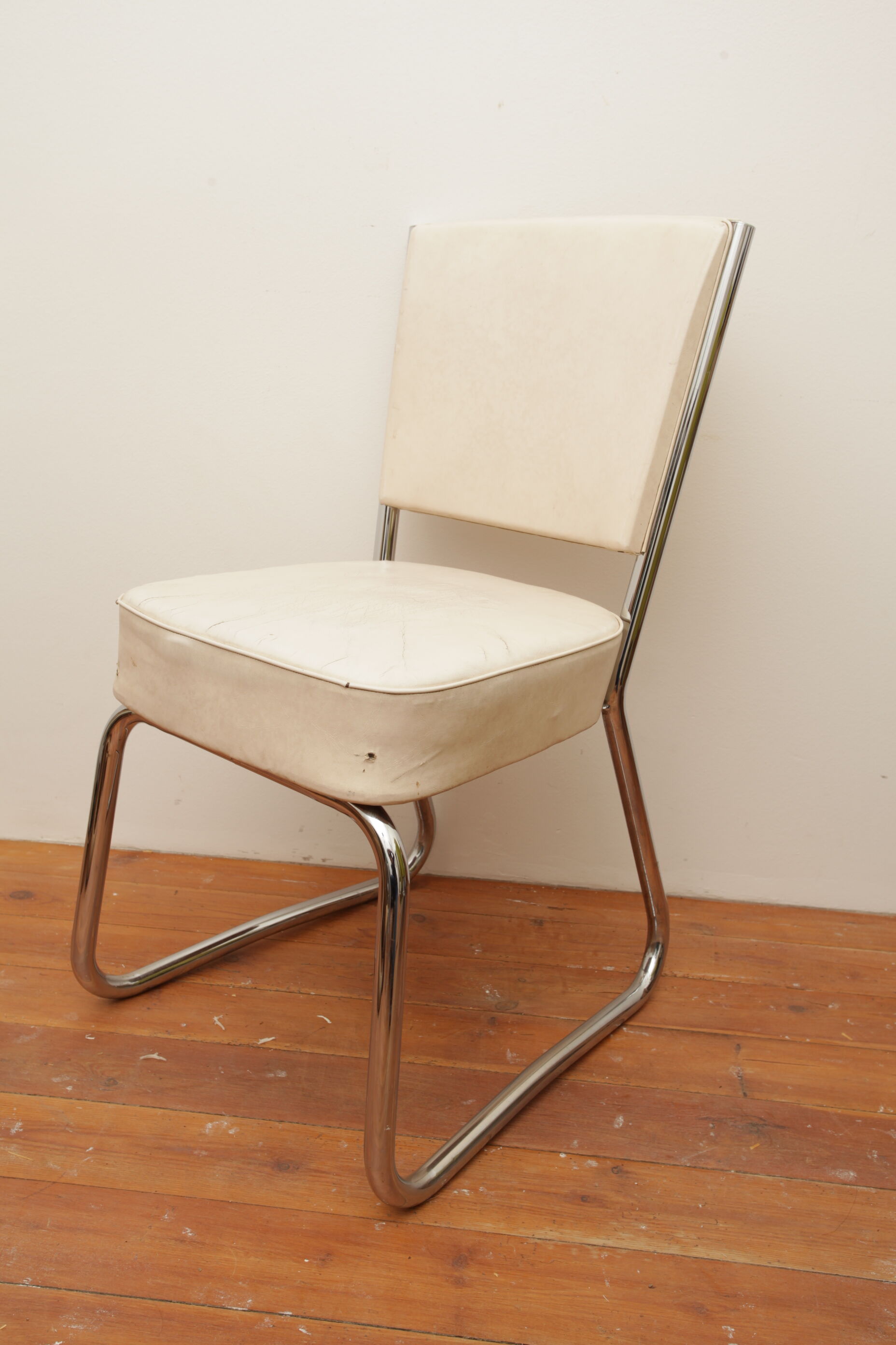 Fauteuil skaï blanc