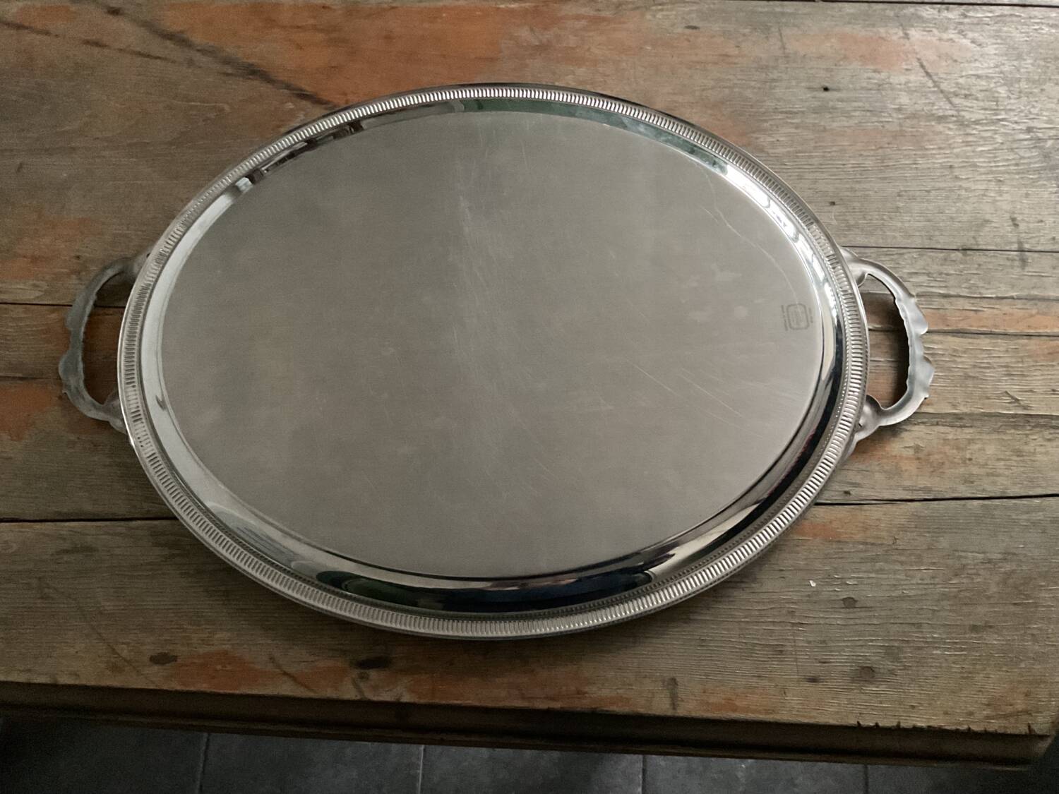 Vintage stainless steel plateau by Jean Couzon.