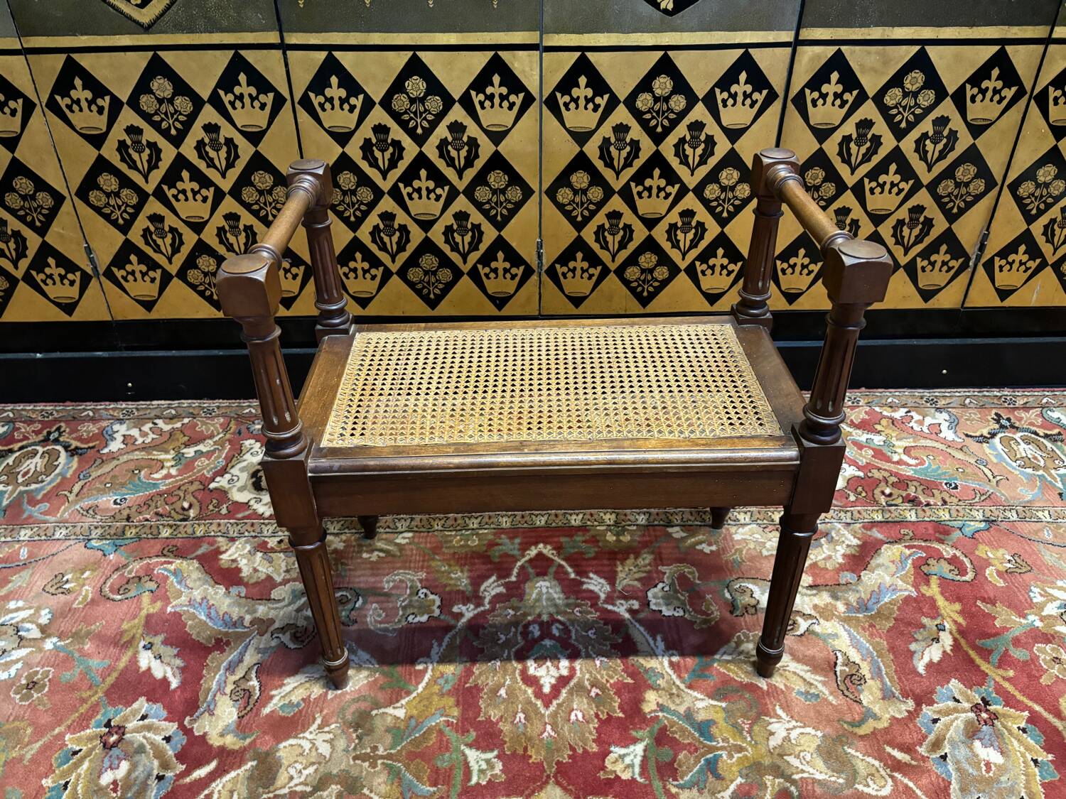 Small Louis XVI style cane bench