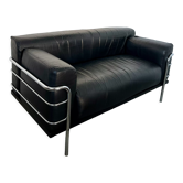 Old vintage leather and tubular metal sofa, design 70s