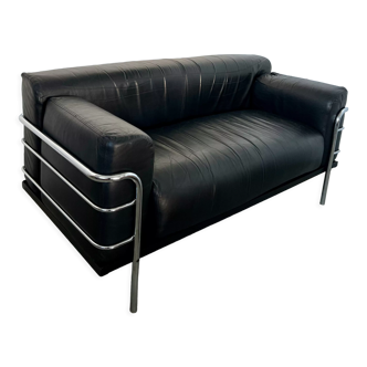 Old vintage leather and tubular metal sofa, design 70s