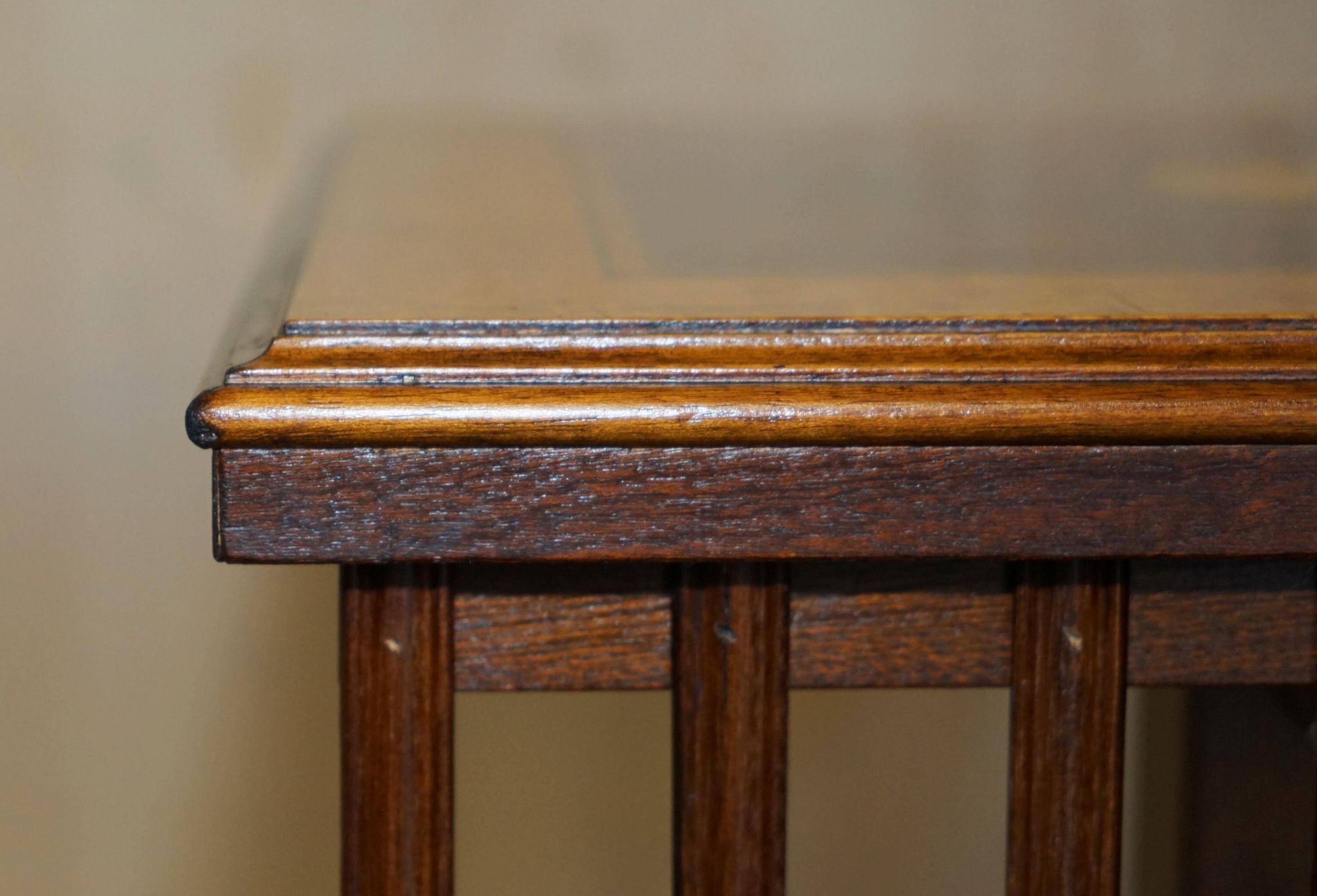 Sheraton Revival rotating library table in walnut and satin wood.