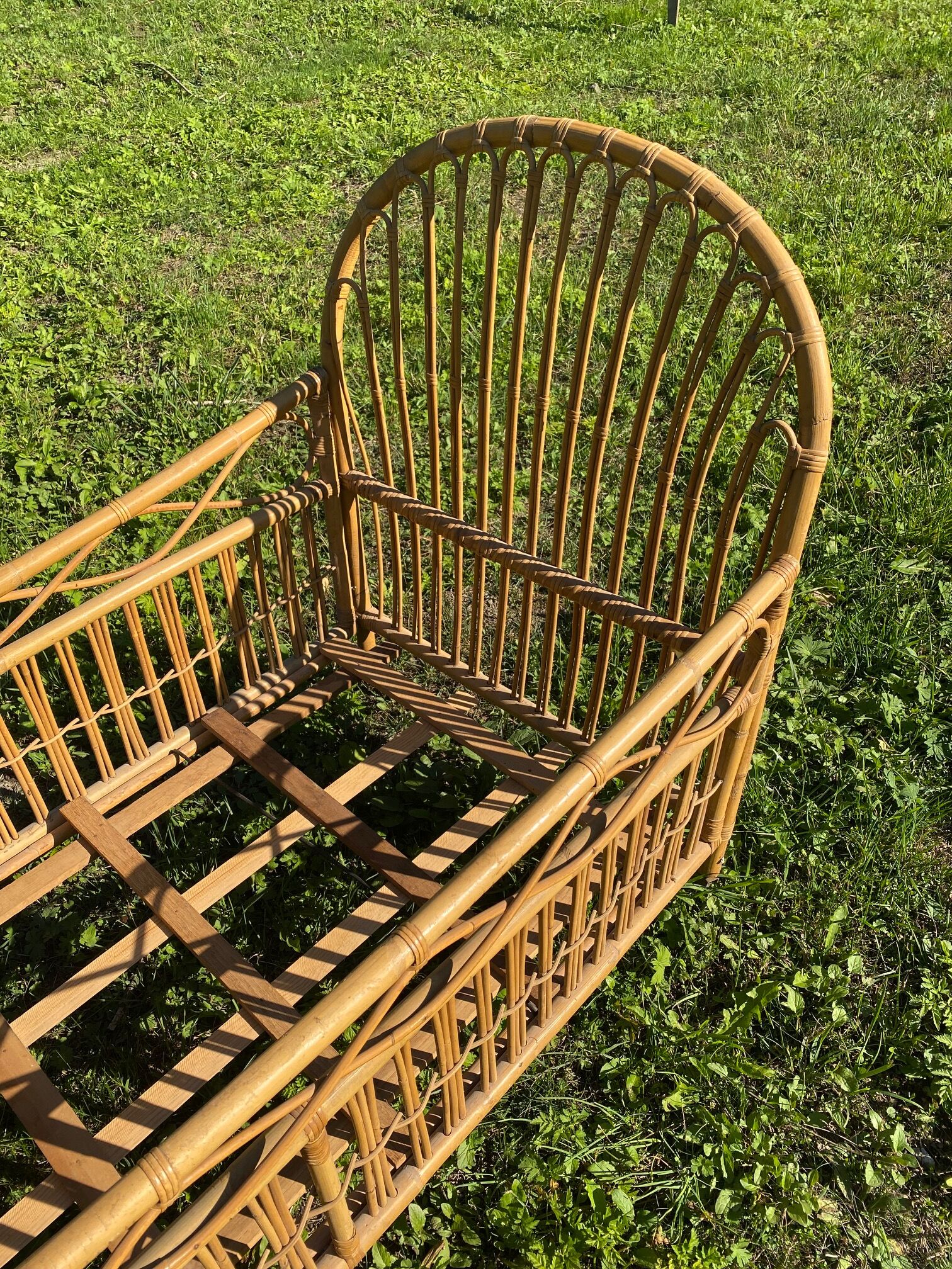 Children's bed in vintage rattan