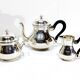 3-piece silver and ebony tea set
