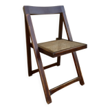 Wooden folding chair with caned seat