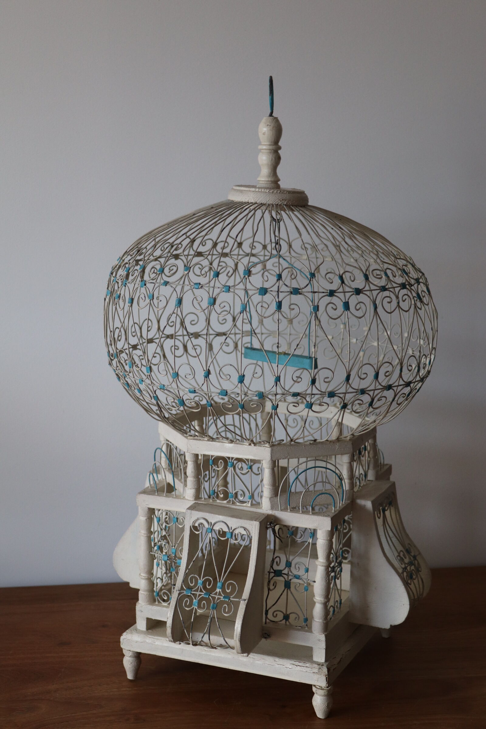 Vintage white and blue birdcage