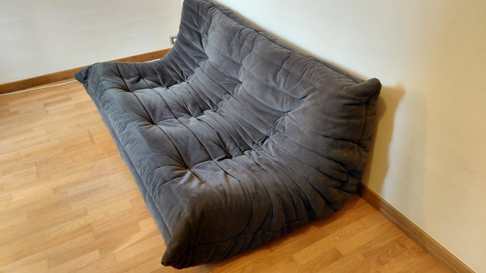 Togo corner sofa by Ligne Roset in anthracite alcantara.