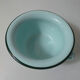 Old green enamelled steel pot cover