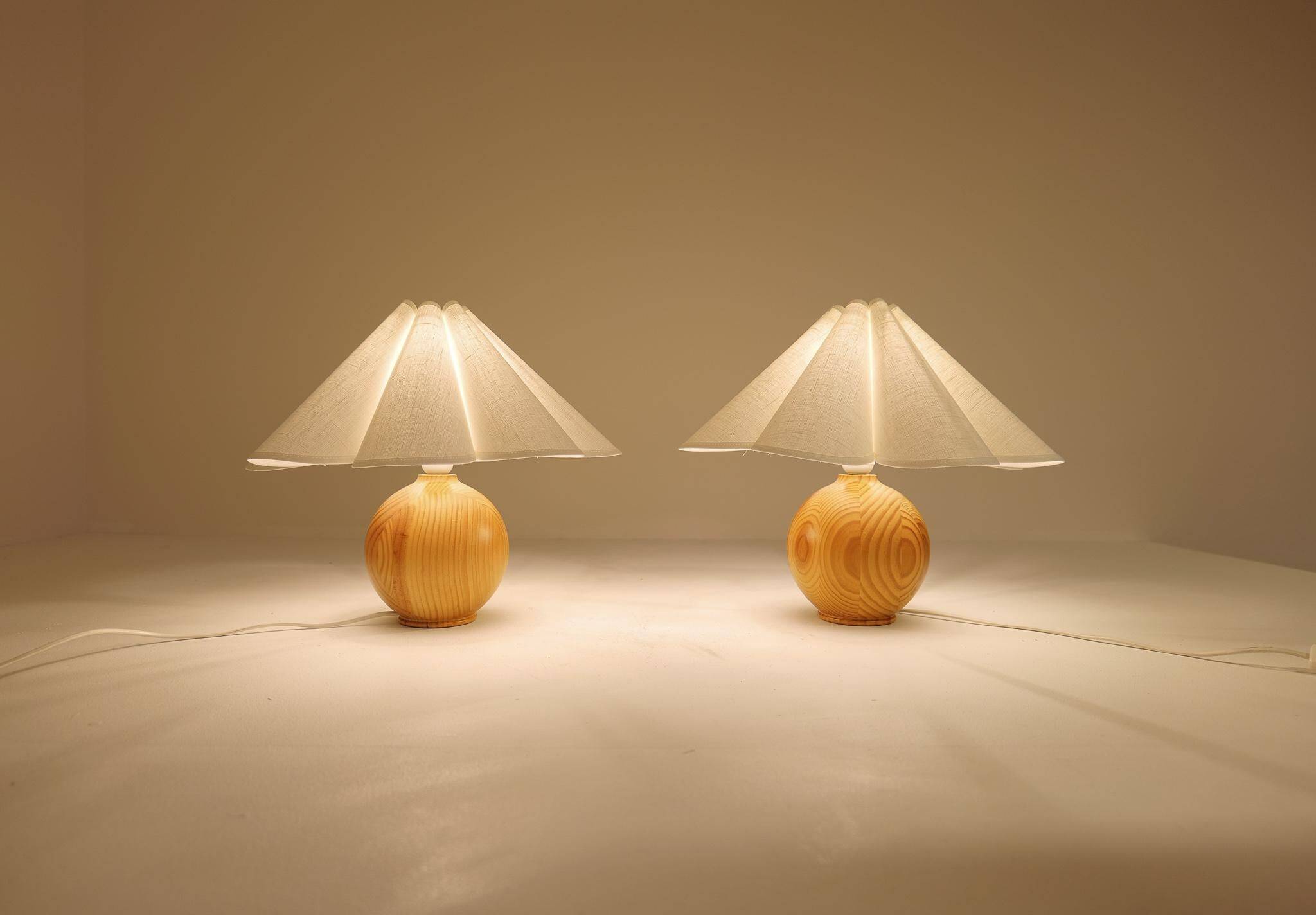 Sculptural modern table lamps from the mid-century in solid pine, Sweden, 1970s.