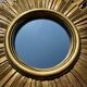 Vintage sun mirror 1960 in patinated golden balsa