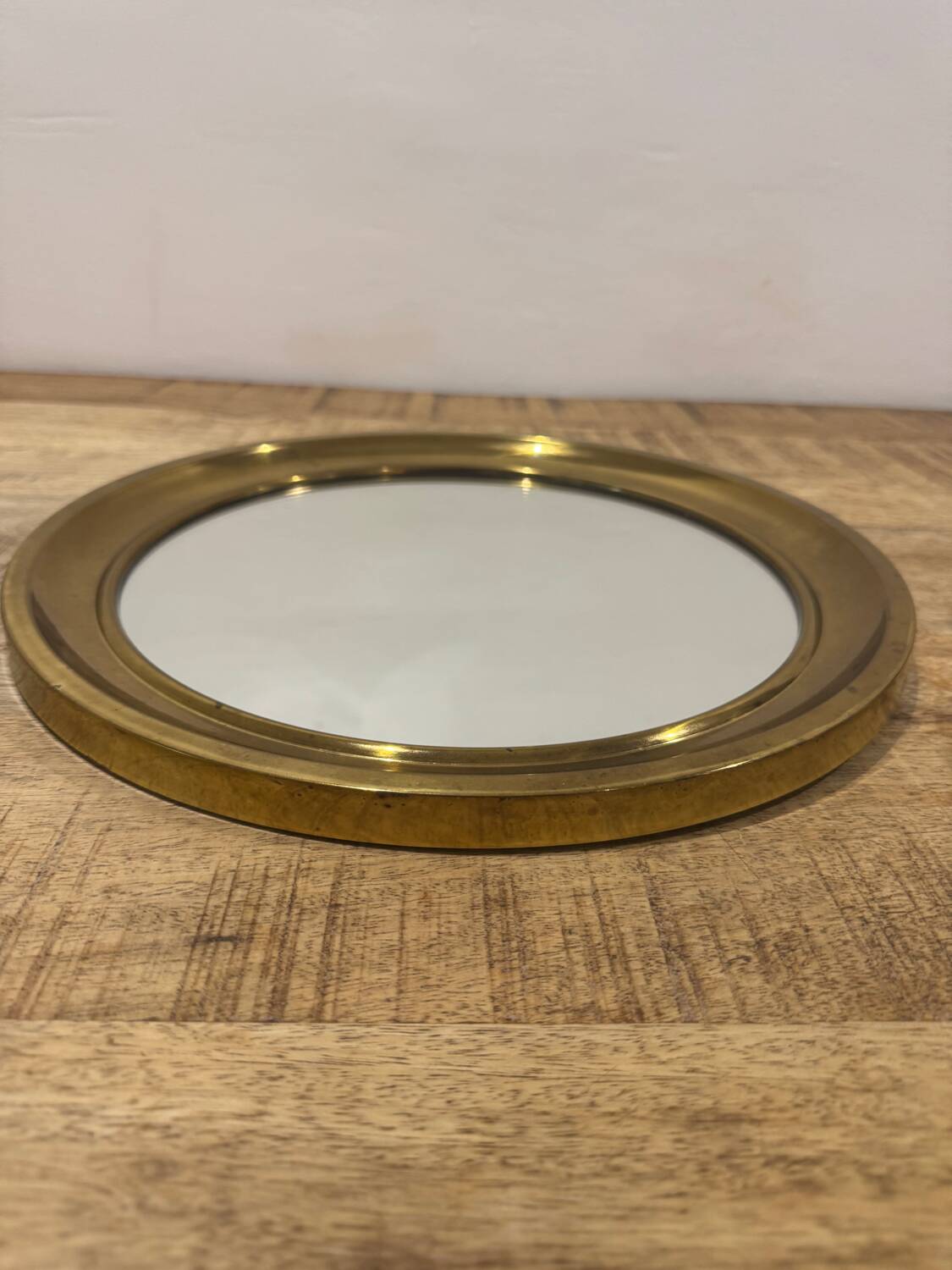 Golden round mirror