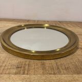 Golden round mirror