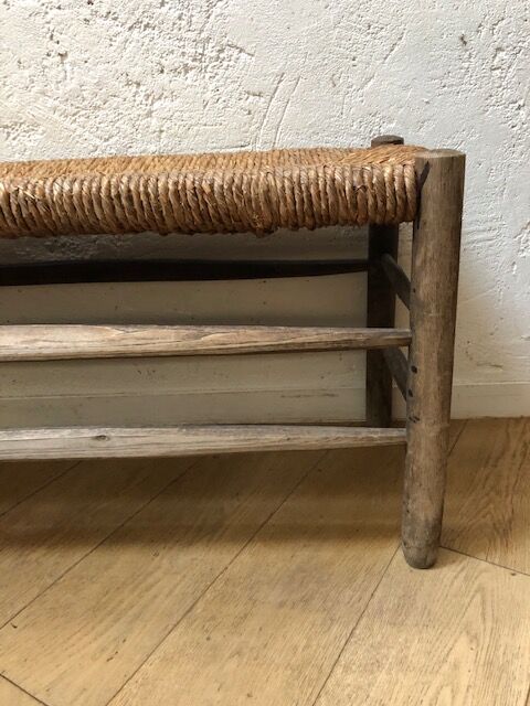 Wooden and straw bench