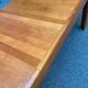 Scandinavian extendable dining table in honey-stained wood for 12 people 1990