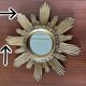 Vintage sun mirror in 60s/70s gold resin