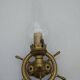 Brass wall sconces with nautical decor