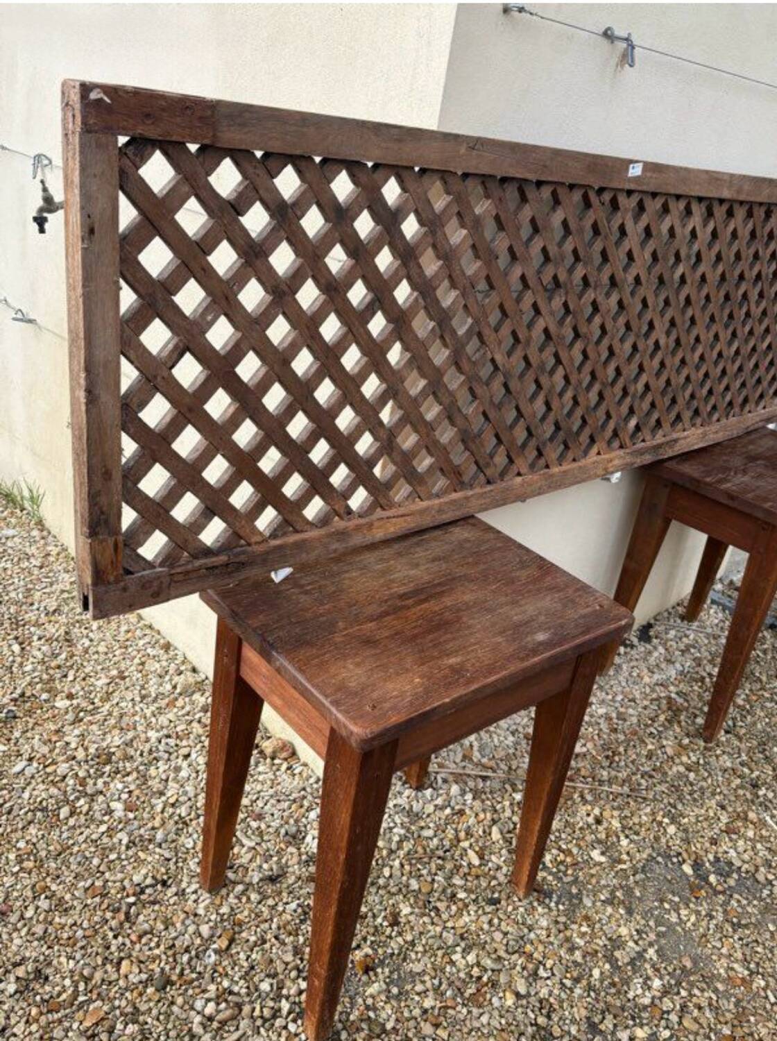 Headboard and its two wooden bedside tables.