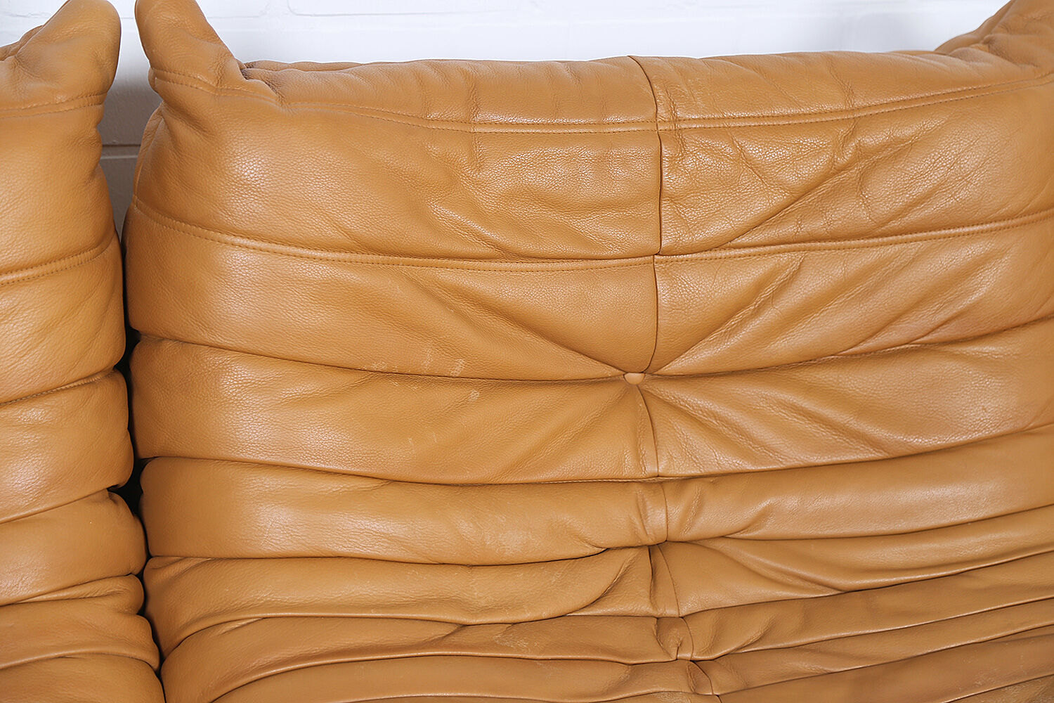 Cognac leather Ligne Roset Togo set from 2010 designed by Michel Ducaroy
