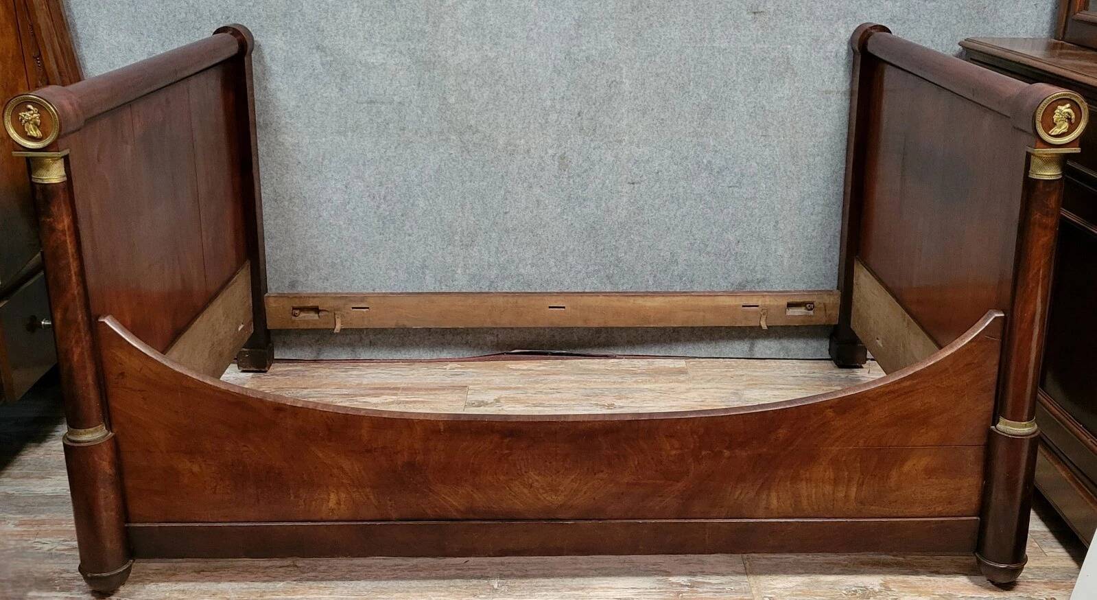 Rare Empire period mahogany bed with gilt bronze profiles circa 1800