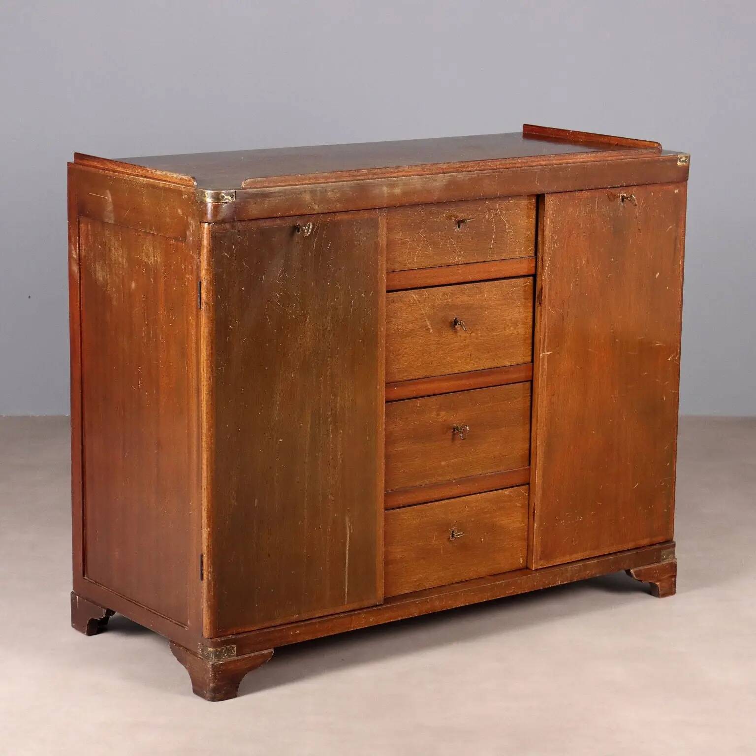 Antique mahogany commode with brass details, 4 drawers, 20th century.