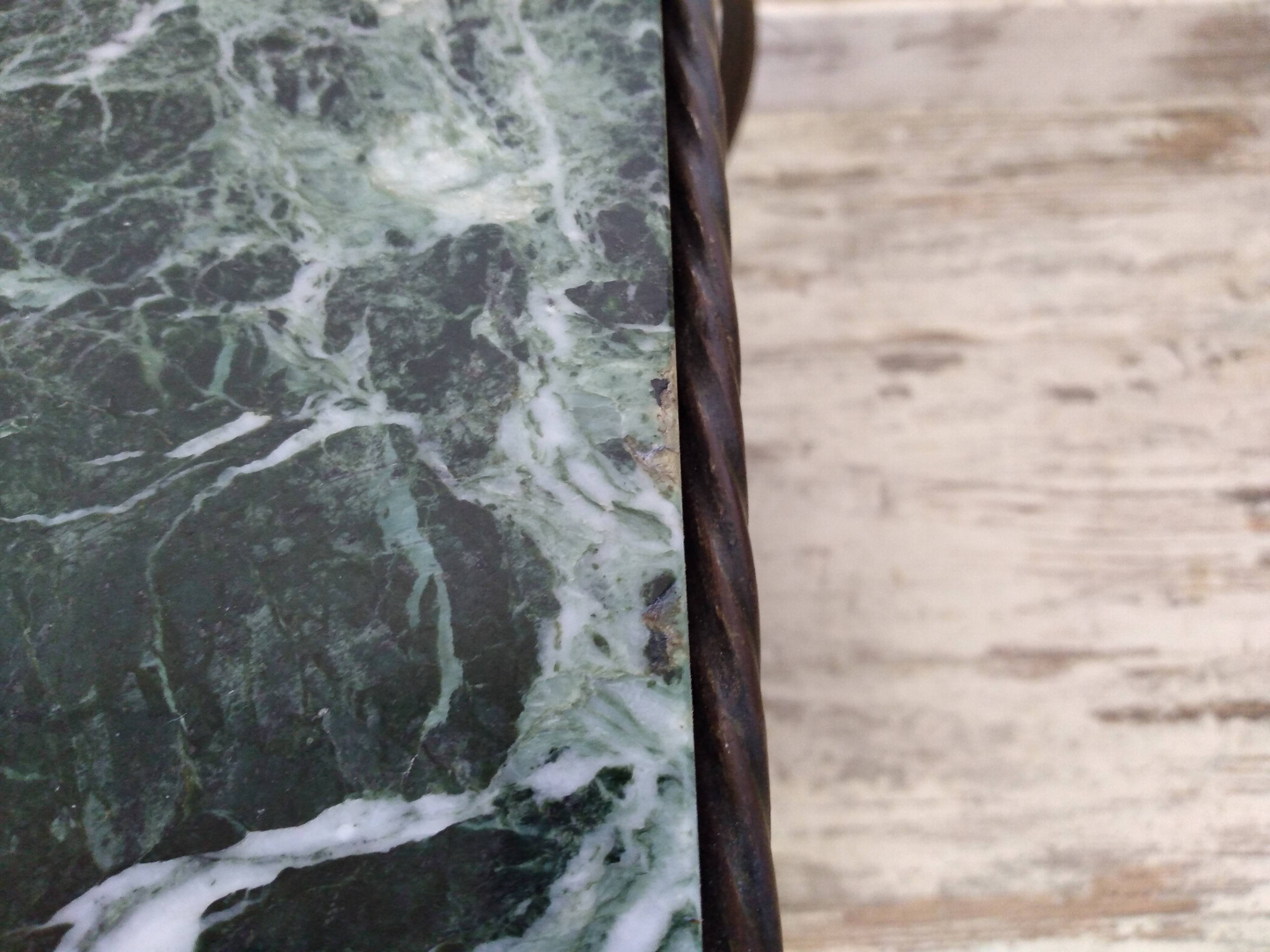 Wrought iron and marble coffee table