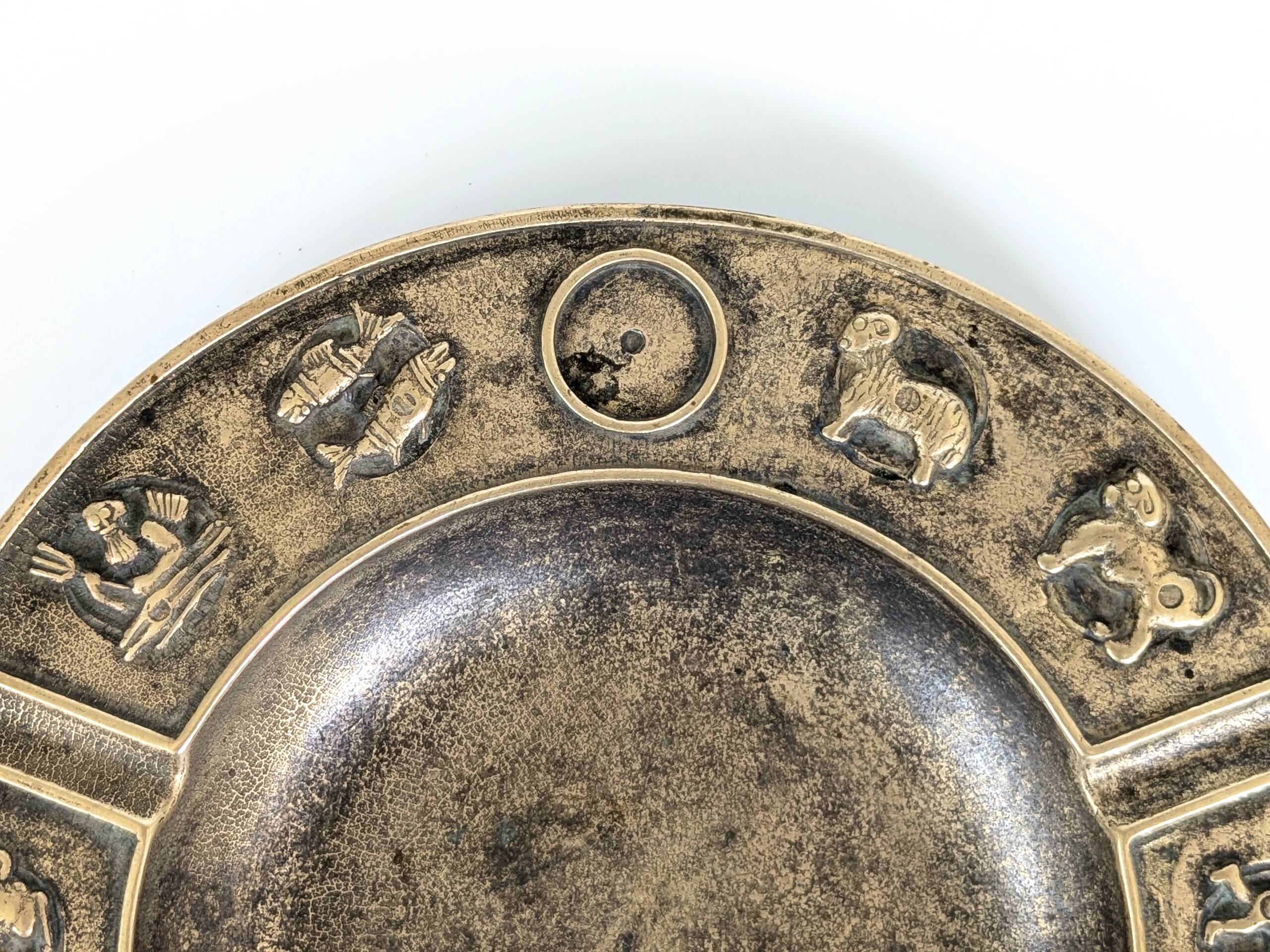 Large brass pocket emptier | Zodiac signs