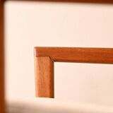 Upholstered armchair with teak frame