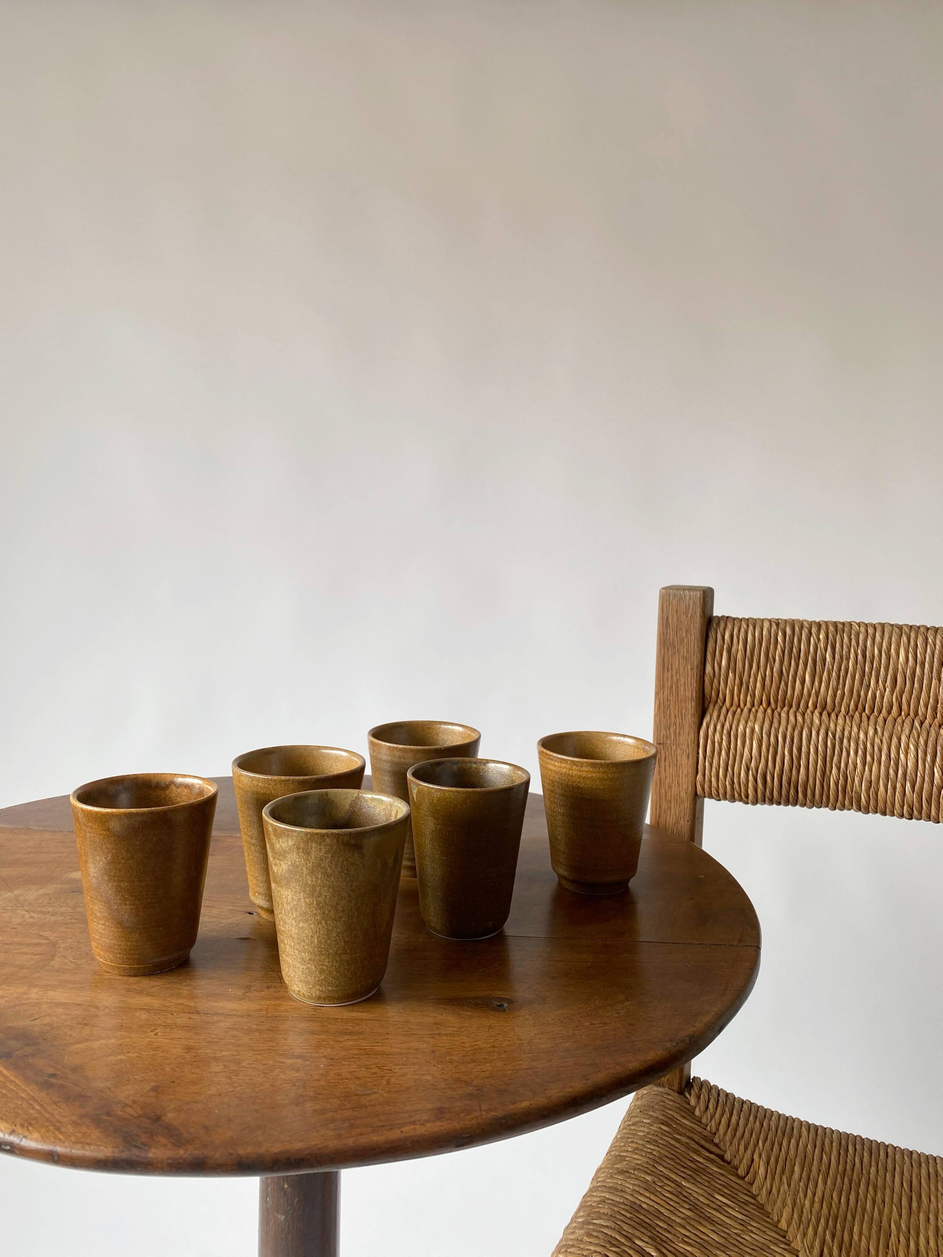 Suite of 6 sandstone glasses