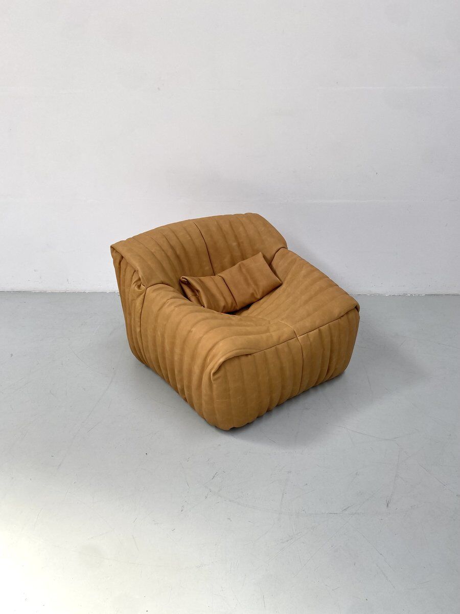 Sandra chair in camel leather by Annie Hiéronimus for Cinna/Ligne Roset.