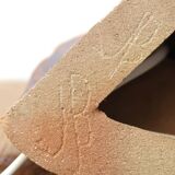 Brutalist sandstone lamp with raffia lampshade
