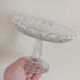 Arabesque molded crystal display cup serrated edges
