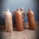 Trio of sandstone carafes with cove