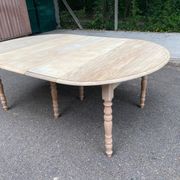 Renovated Louis Philippe round extendable dining table with flaps and 3 extensions.