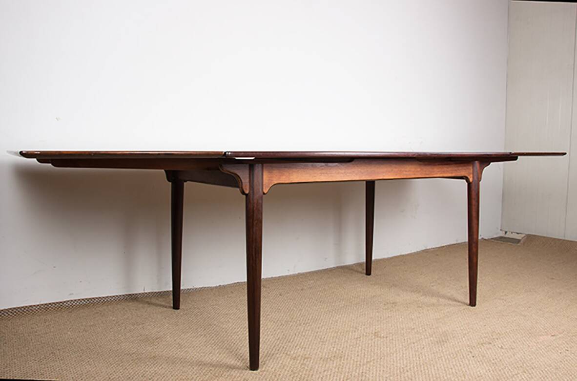 Danish extendable dining table in rosewood, model 54 by Gunni Omann