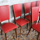 Lot of 8 vintage wooden chairs and red skai