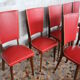 Lot de 8 chaises vintage bois et skai rouge