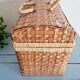 Small suitcase in vintage rattan trunk