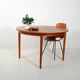 Round extendable teak table by Svante Skogh