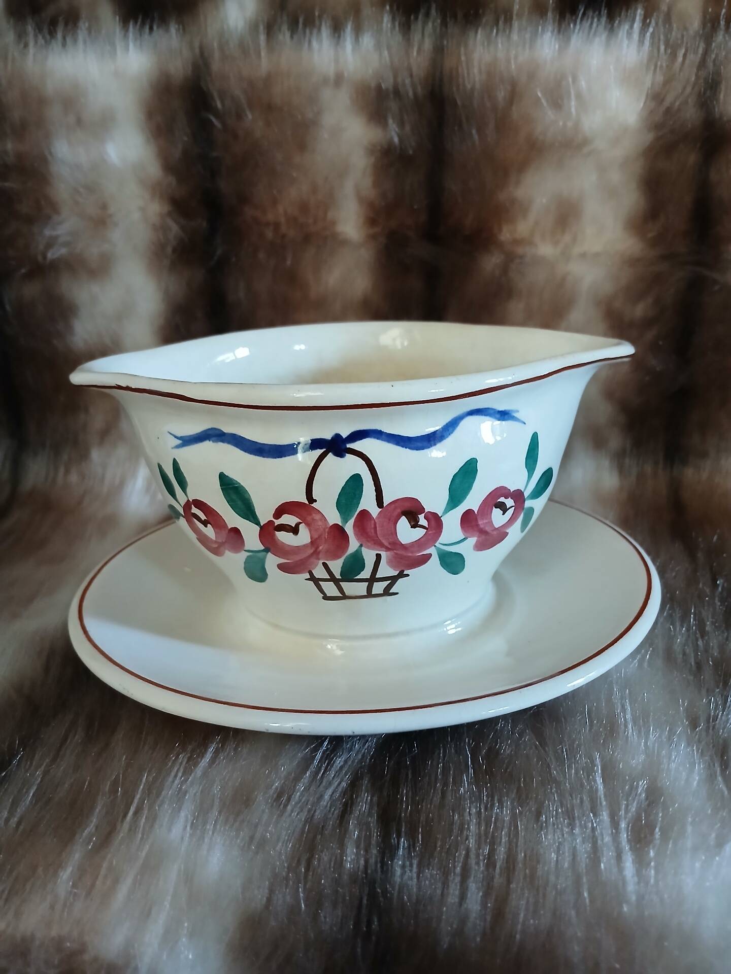 Antique sauce boat in Longchamp ironstone.