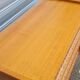 Commode vintage pied compas et rotin