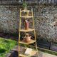 Audoux Minnet style corner shelf in vintage rattan 1950