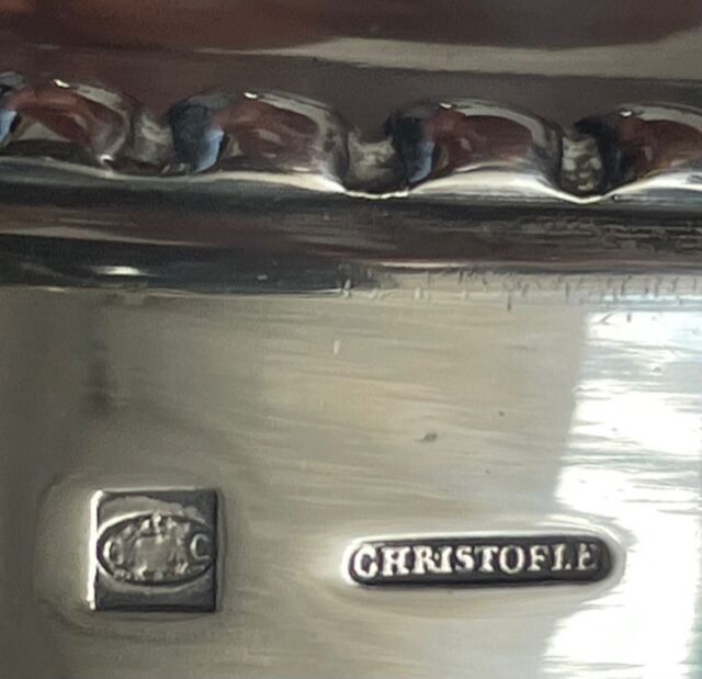 Pair of Christofle silver metal candle holders.