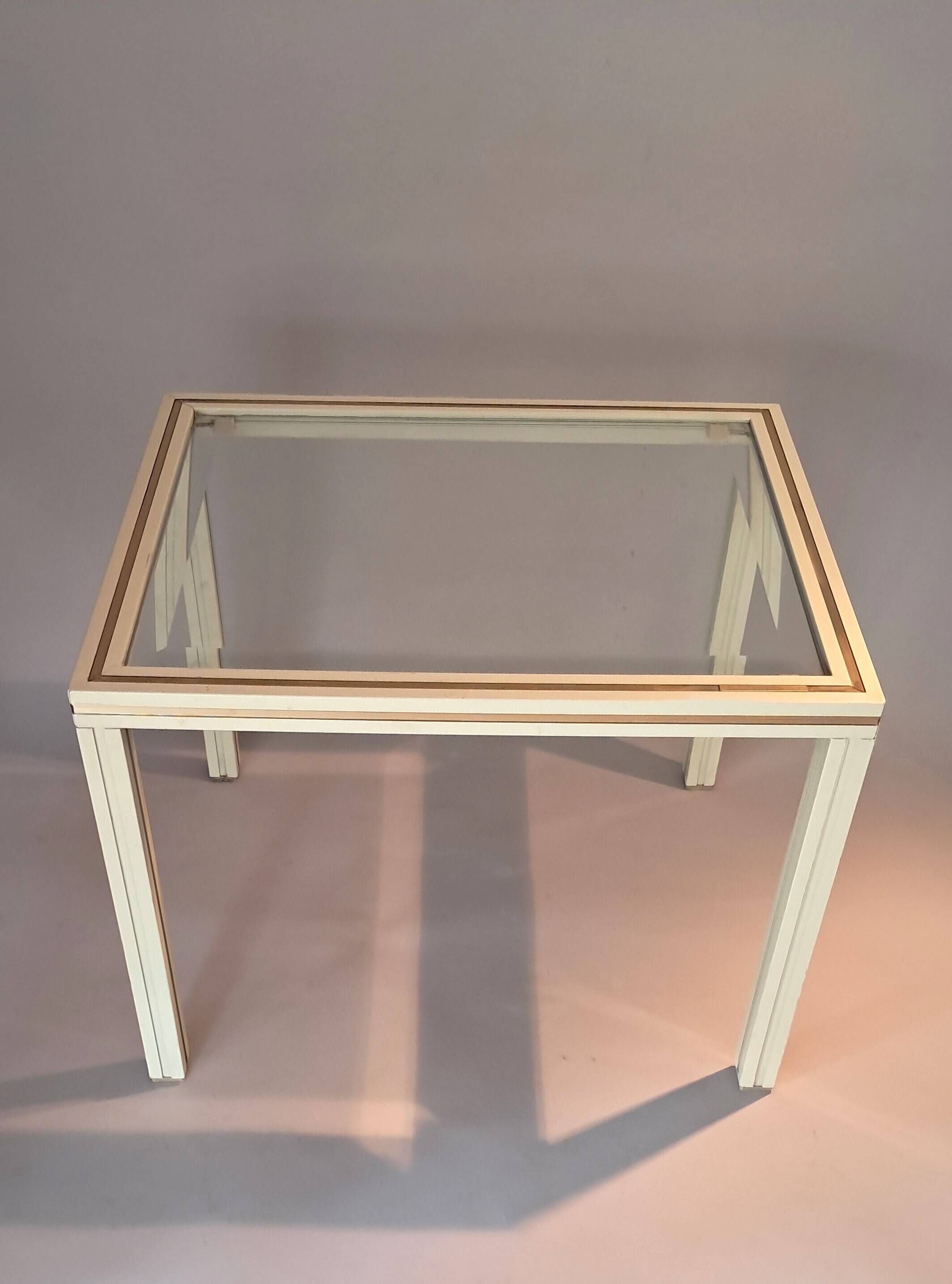 White lacquered side table by Pierre Vandel with gold brass.